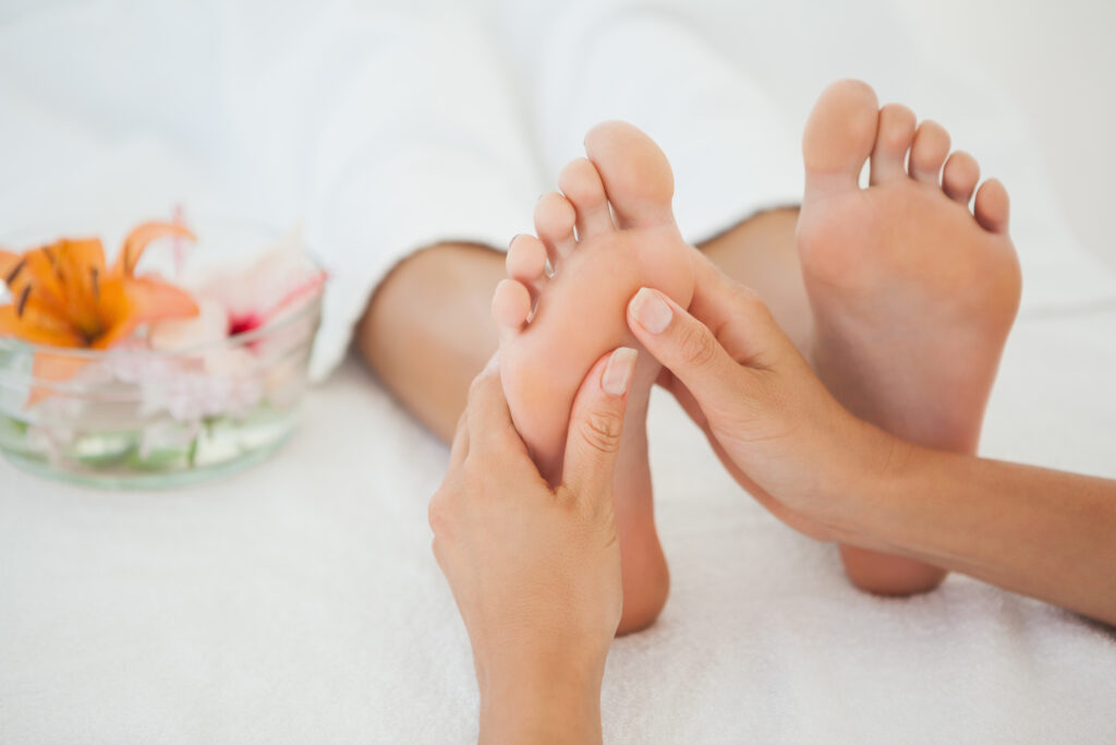 Woman receiving a foot massage at the health spa